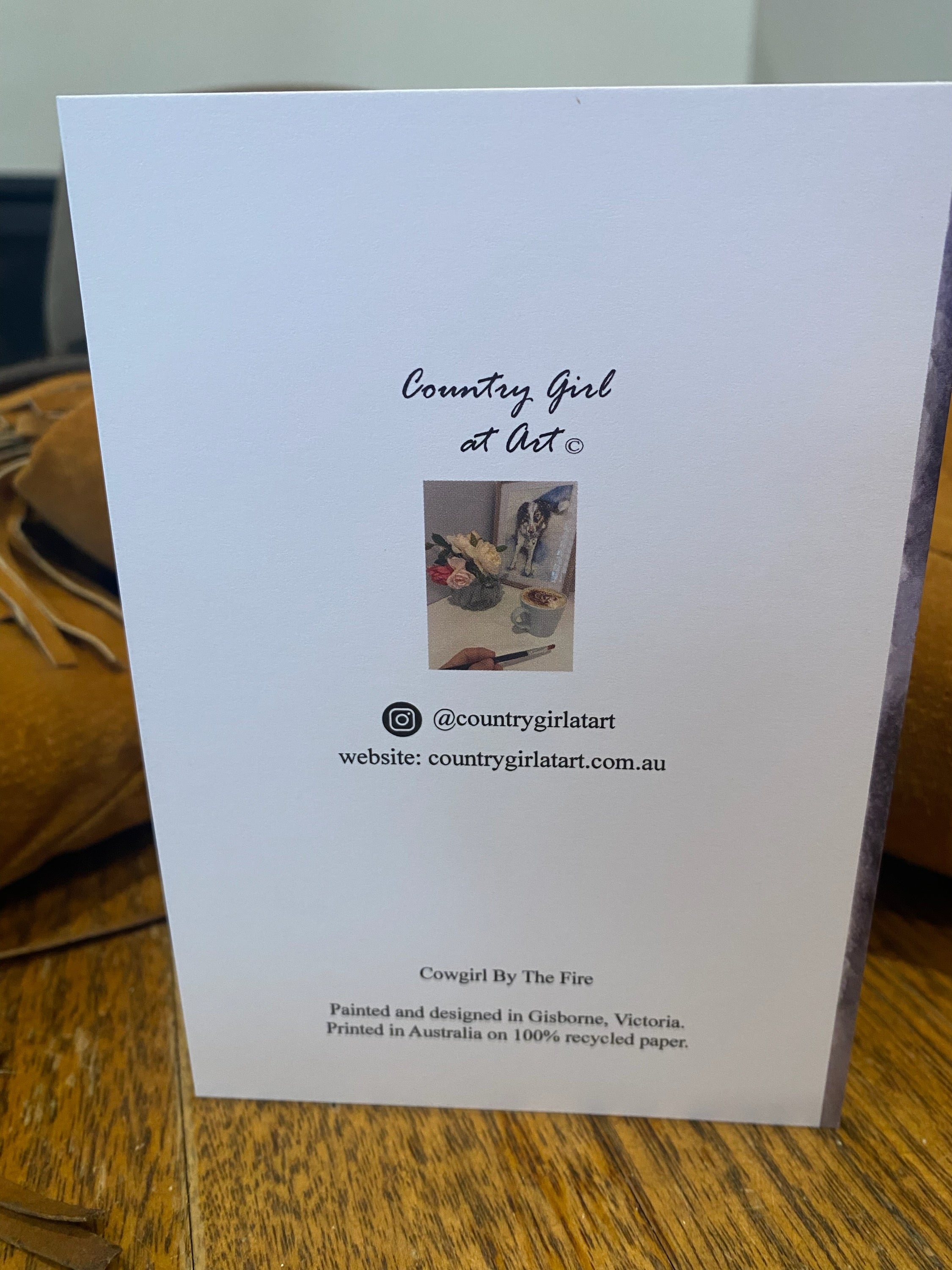 Greeting Card - Cowgirl By The Fire