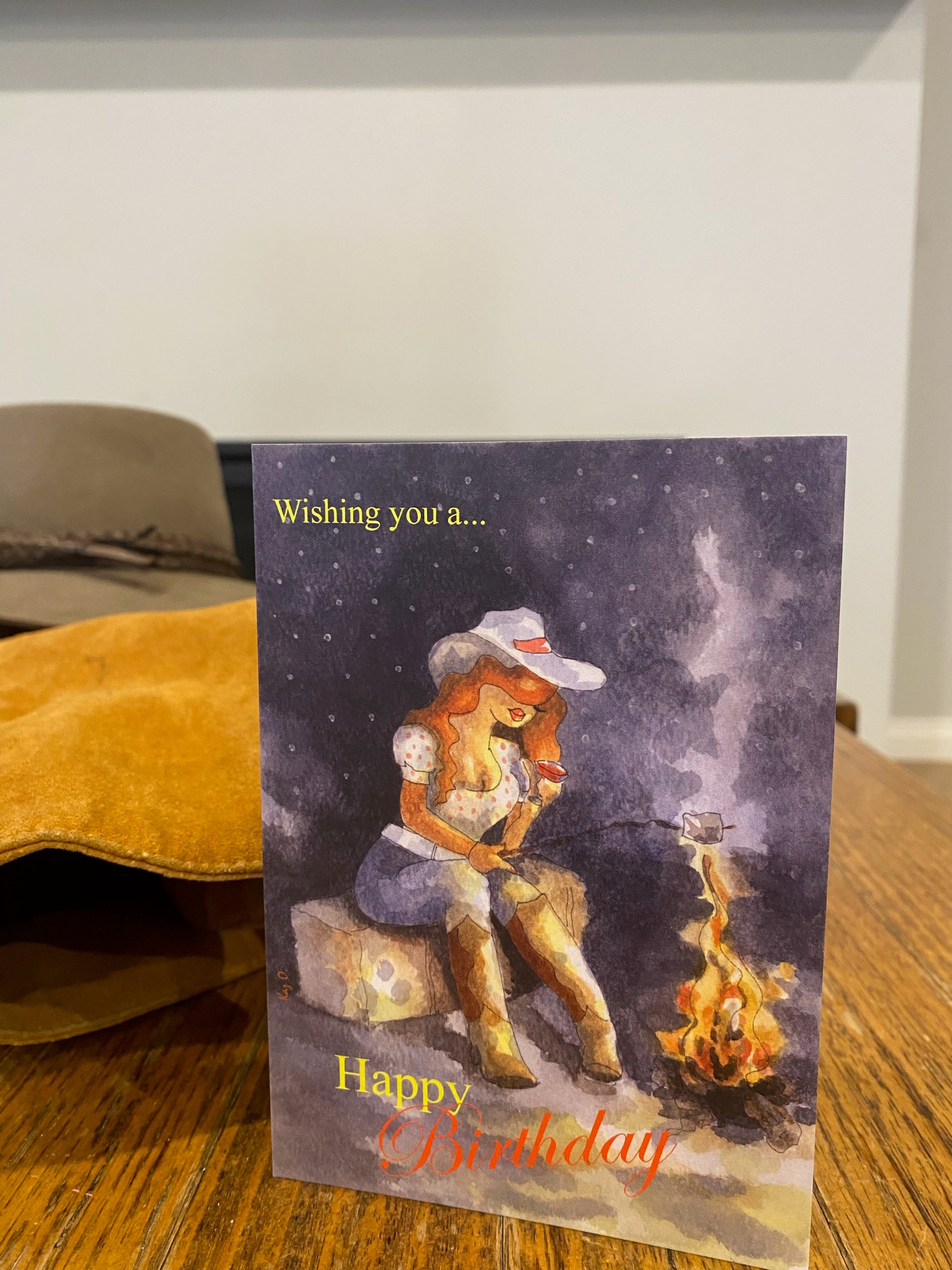 Greeting Card - Cowgirl By The Fire
